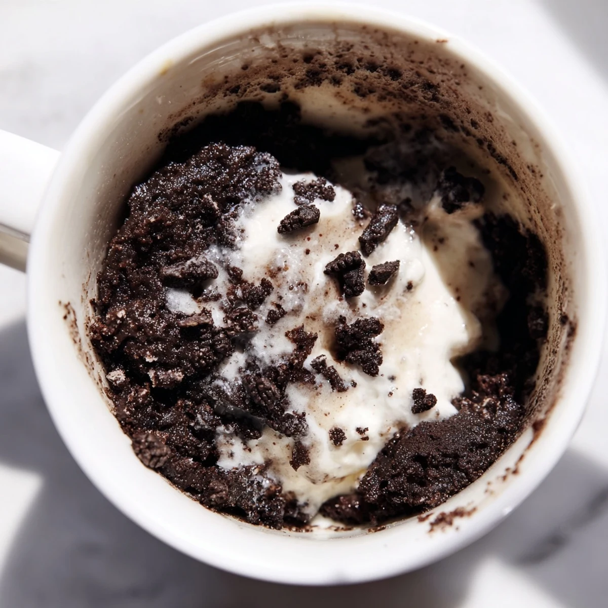 This Oreo Mug Cake is soft and delicious, ready in minutes with a simple recipe.