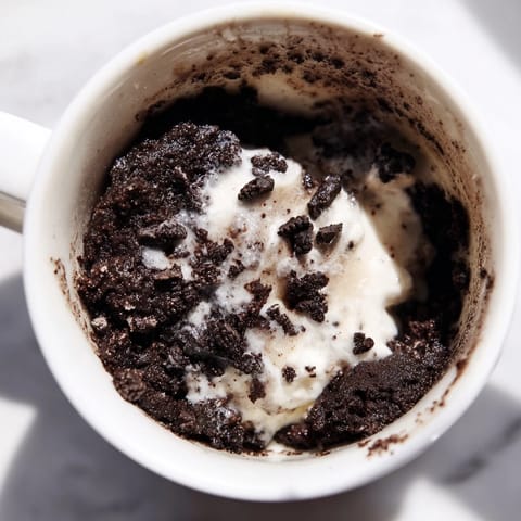 This Oreo Mug Cake is soft and delicious, ready in minutes with a simple recipe.
