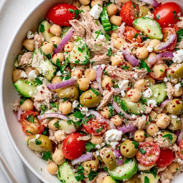 Flavorful Tuna Chickpea Salad overflowing with colorful vegetables, a quick and easy lunchtime favorite.